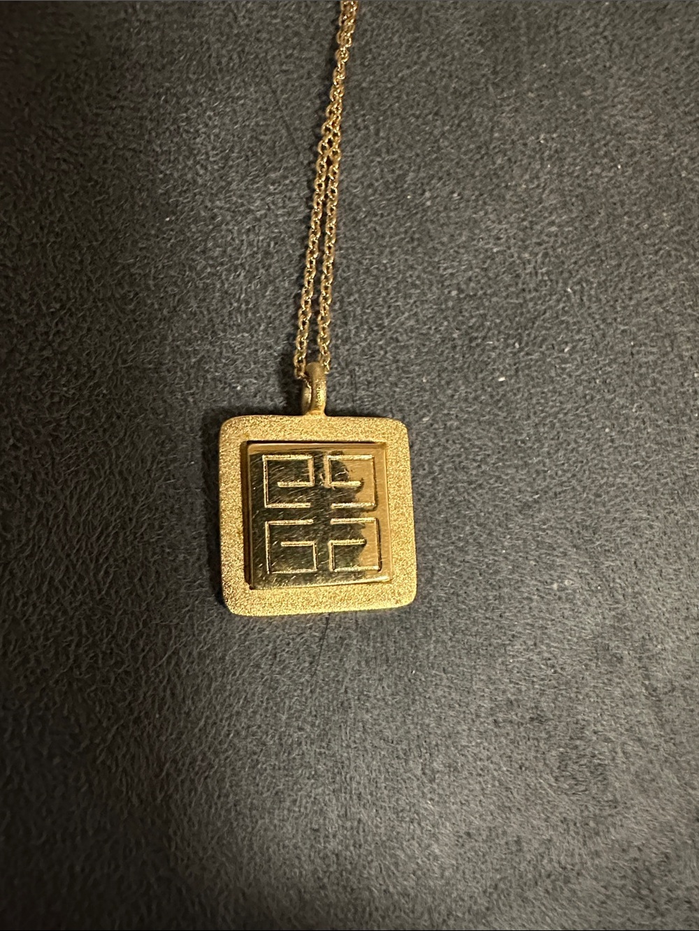 Givenchy Gold Square Logo Pendant Necklace PREOWNED. Measurements: 8 1/2 inches.